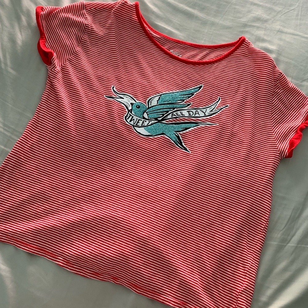 a red & white striped shirt.